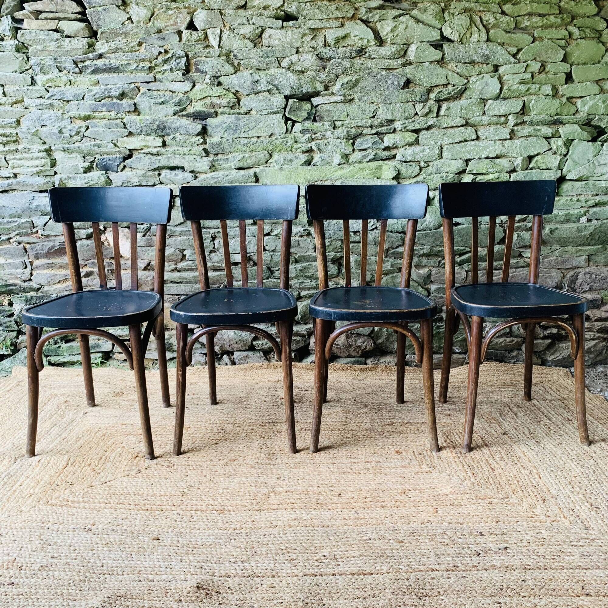 Set of four vintage bentwood bistro chairs.