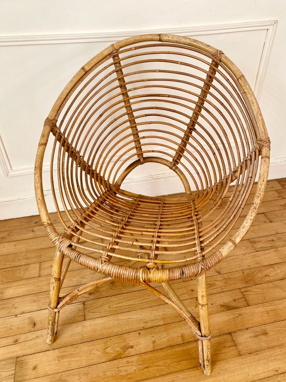 Vintage rattan spiral basket armchair