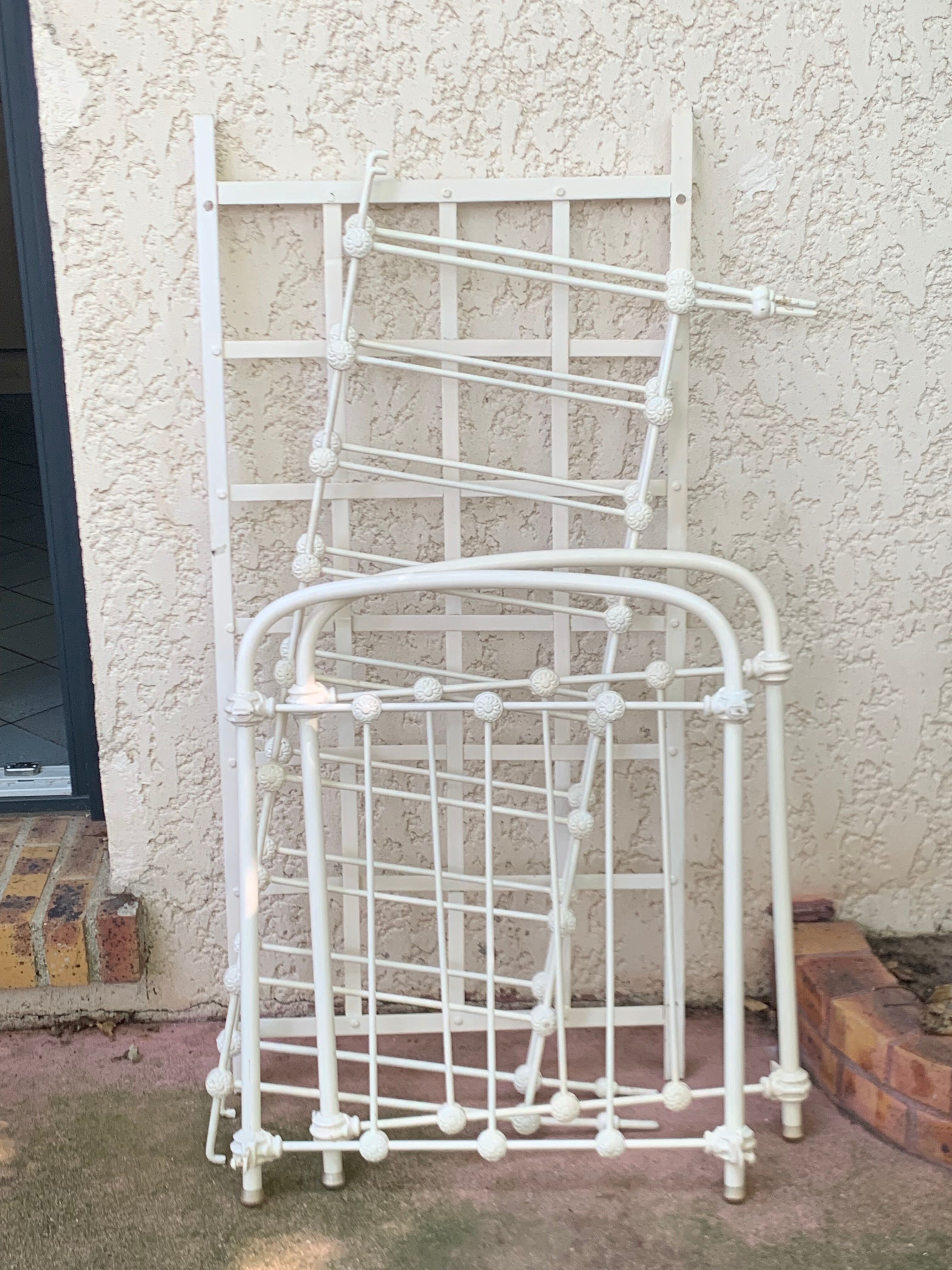 Wrought iron sofa bed with box spring.