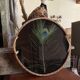Vintage rattan tray with peacock feather