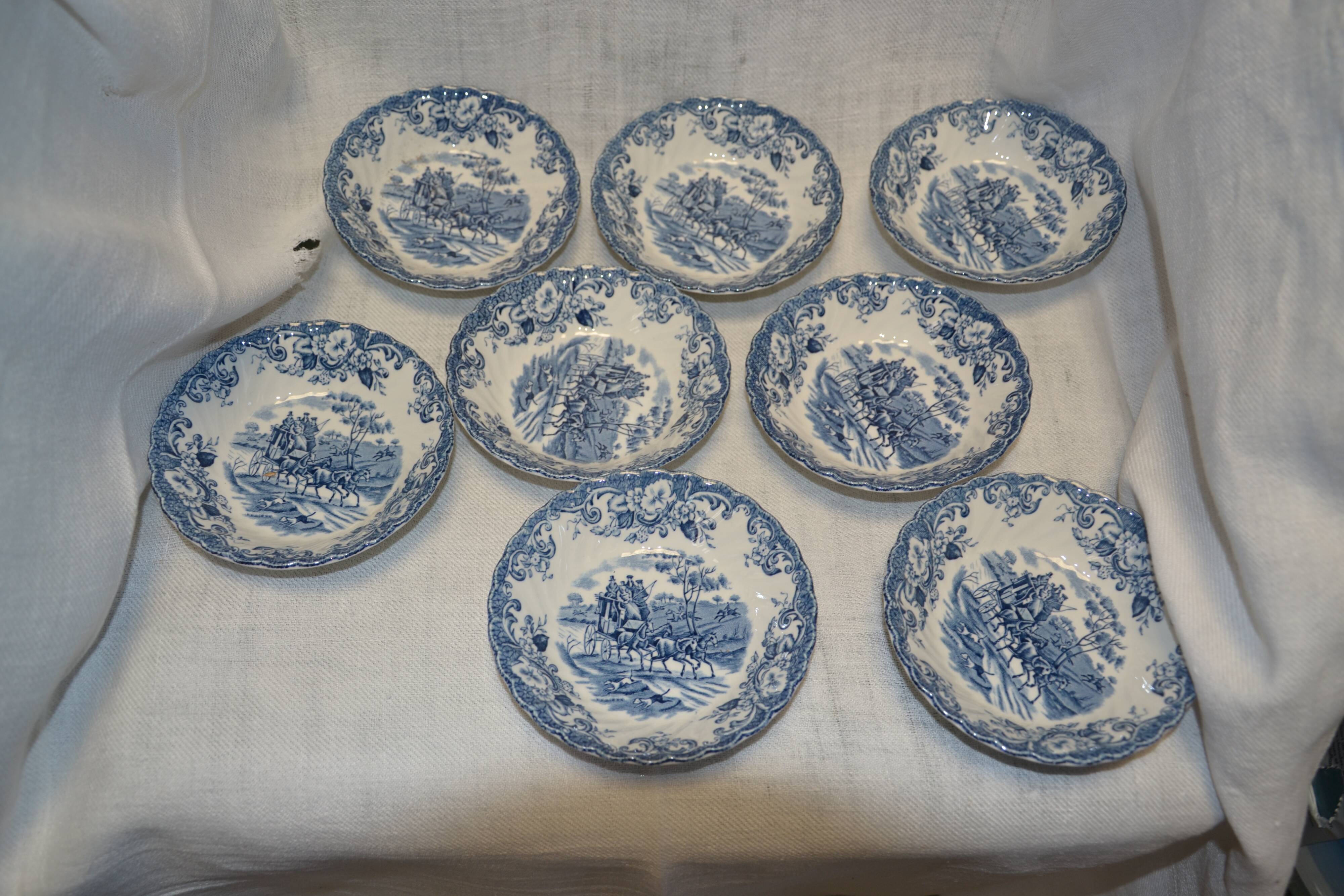 lots of 8 bowls with blue decor