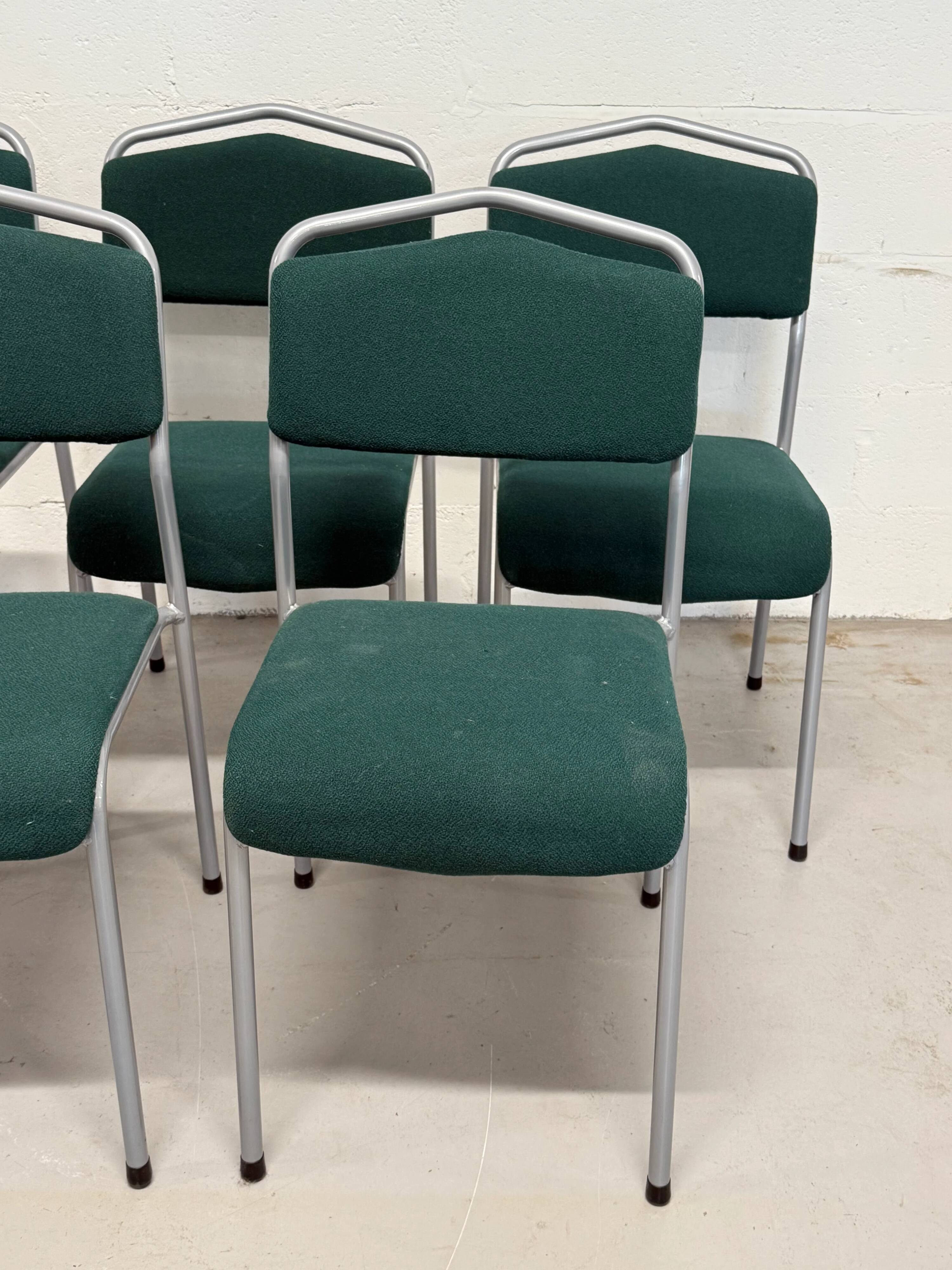 Set of 5 green padded vintage stackable chairs.