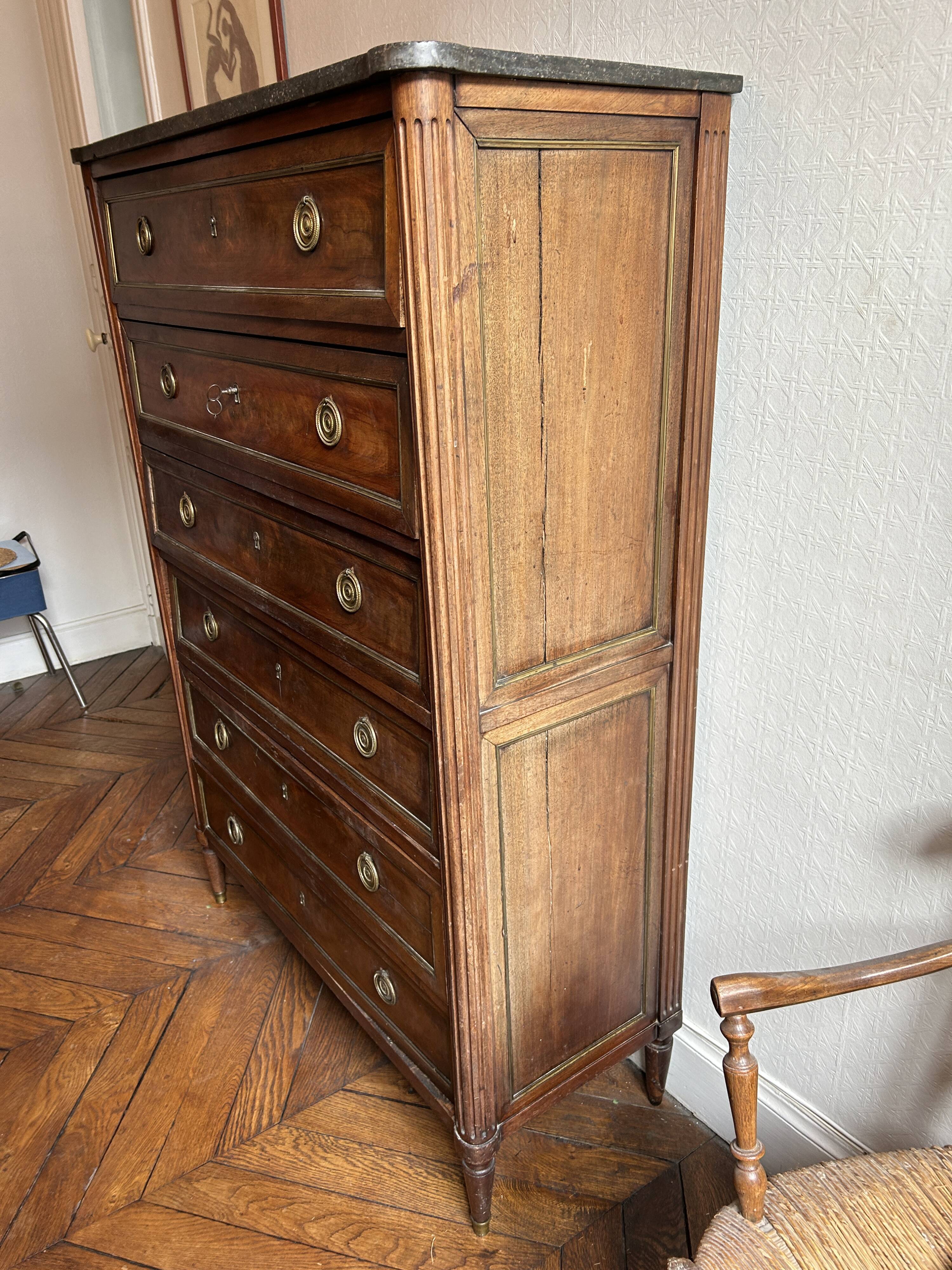 Mahogany and black marble chest of drawers, late 18th-early 19th century