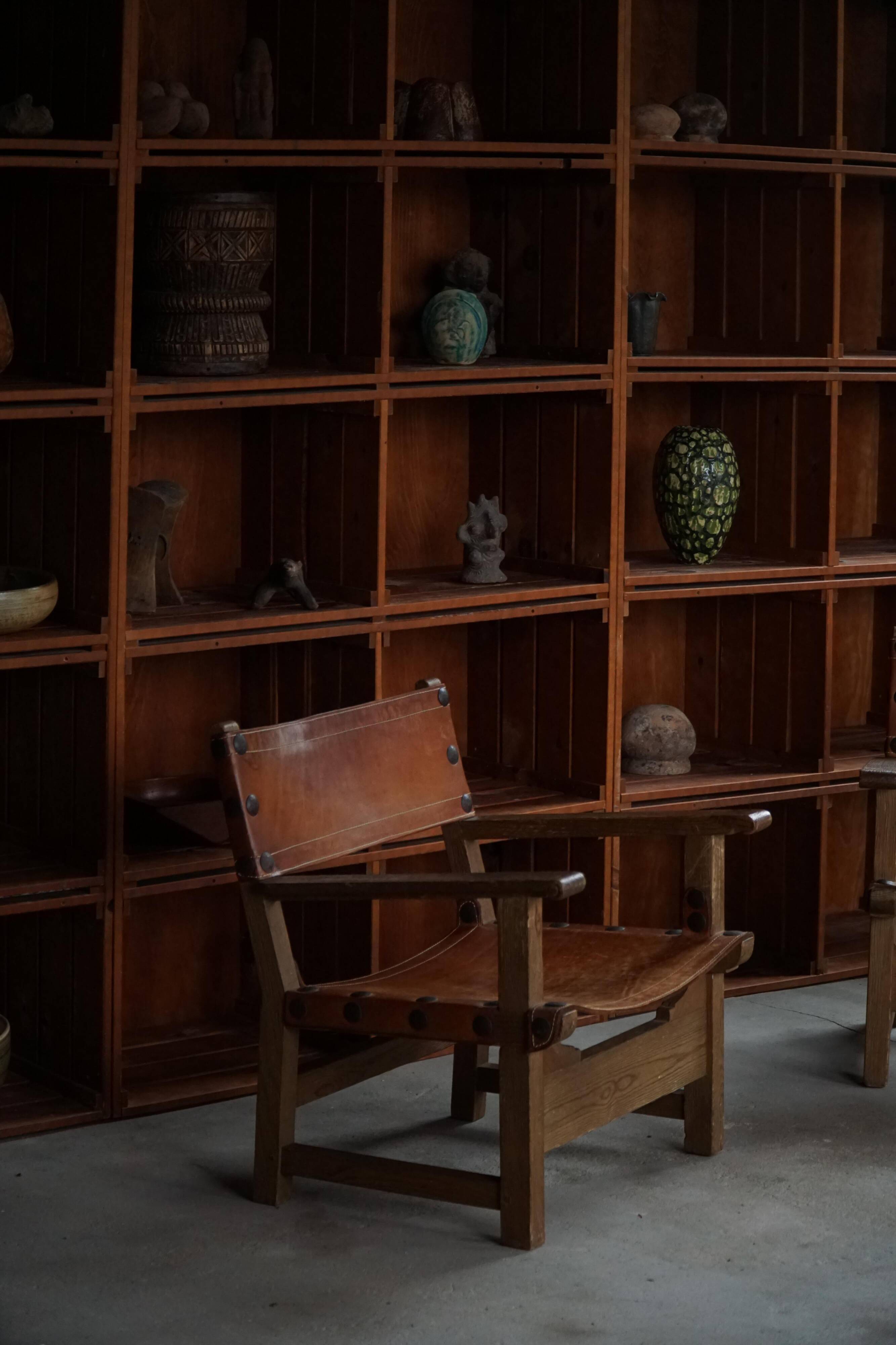 Pair of Spanish brutalist armchairs from the 1960s, wood and leather.