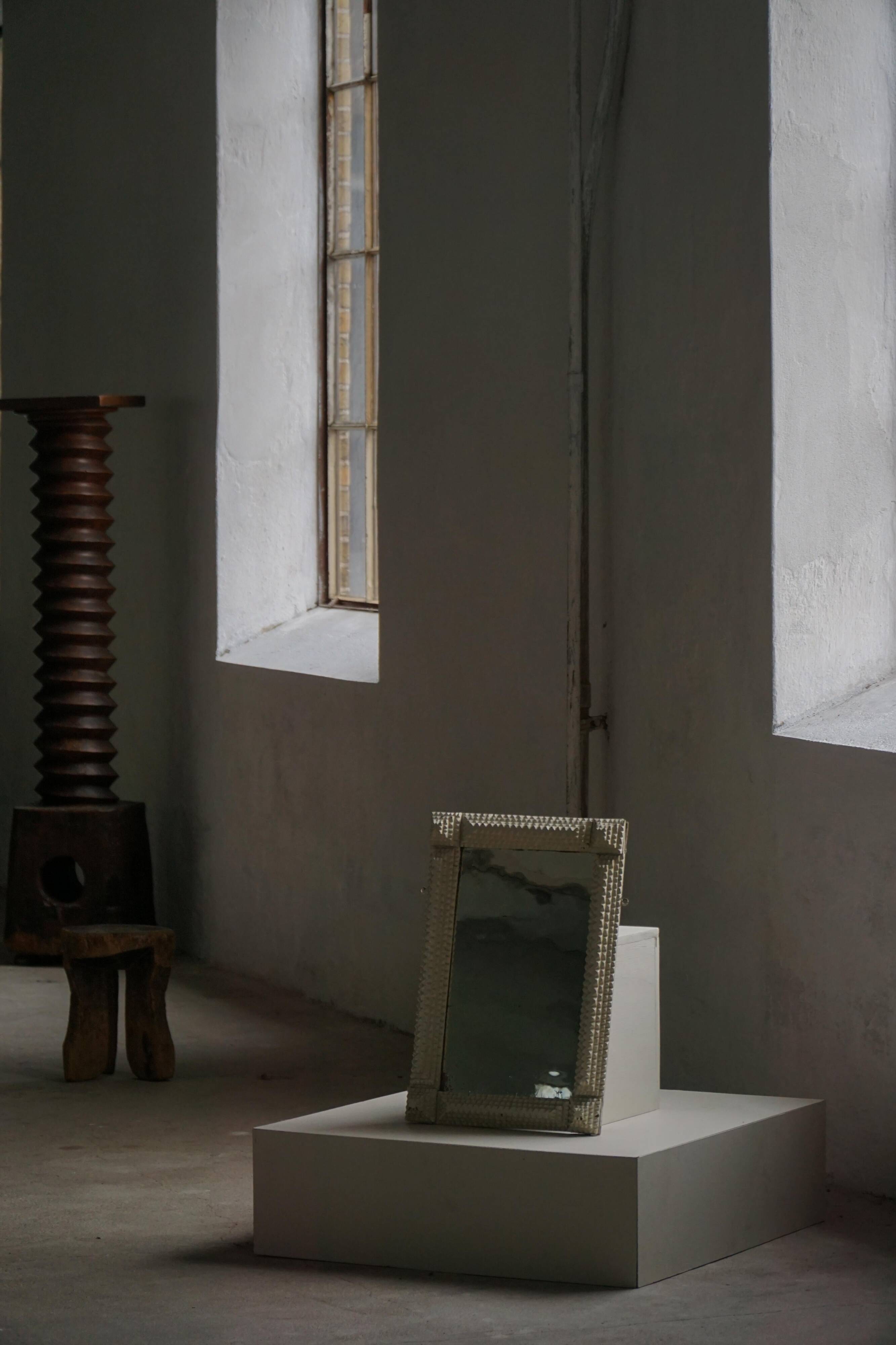 Wall mirror in tramp art style, hand-carved with a painted white frame, early 1900s.