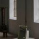 Wall mirror in tramp art style, hand-carved with a painted white frame, early 1900s.