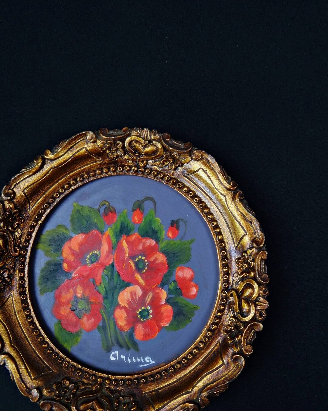 Still life in Tondo oil on panel of a bouquet of poppies signed