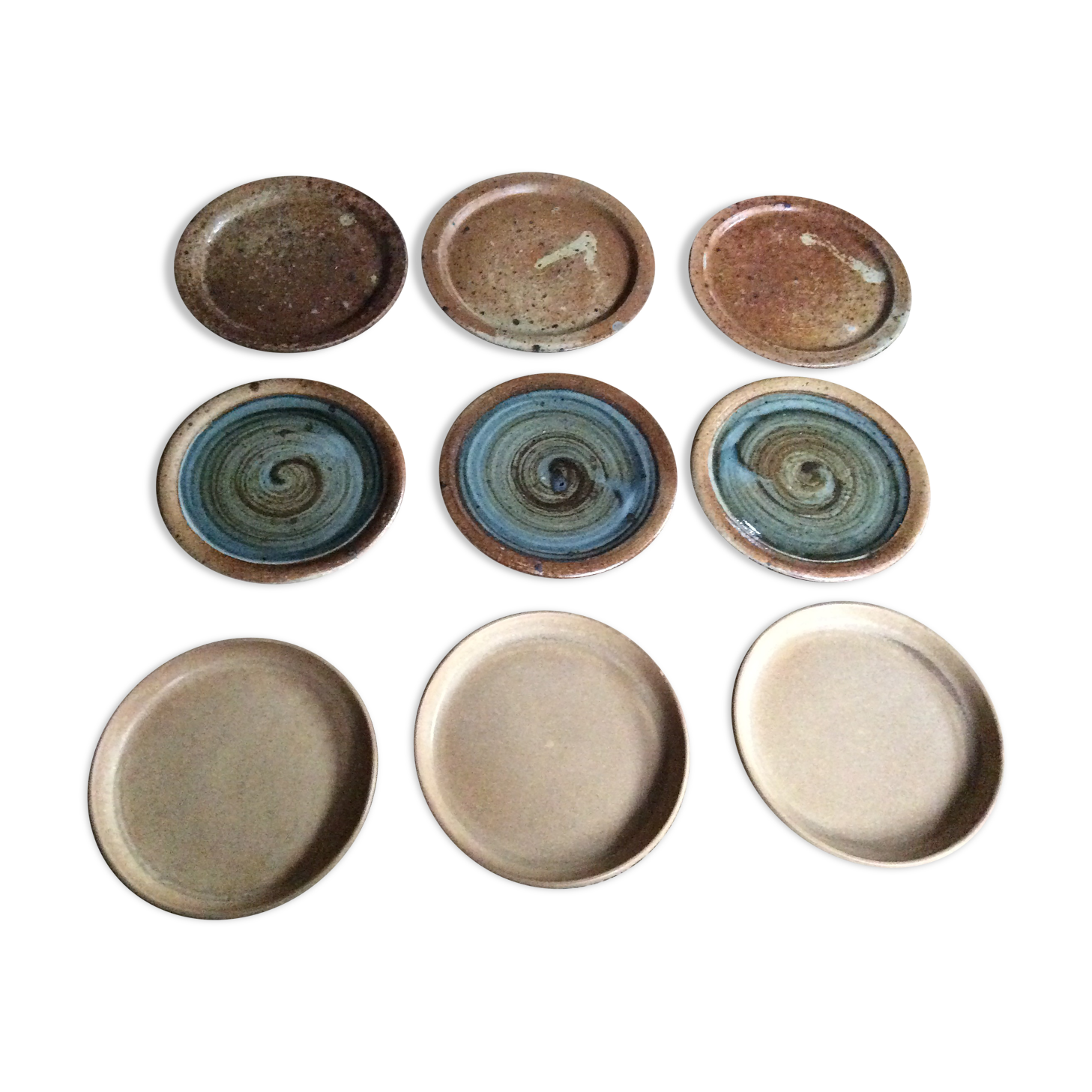 Set of 9 stoneware plates