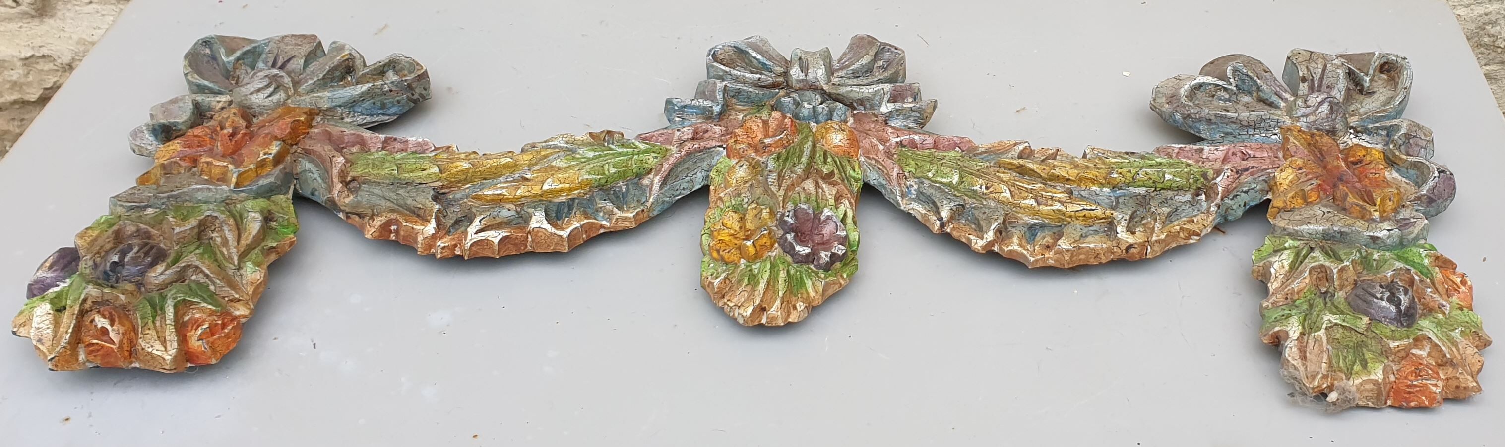 Polychrome carved wood decorative fronthead