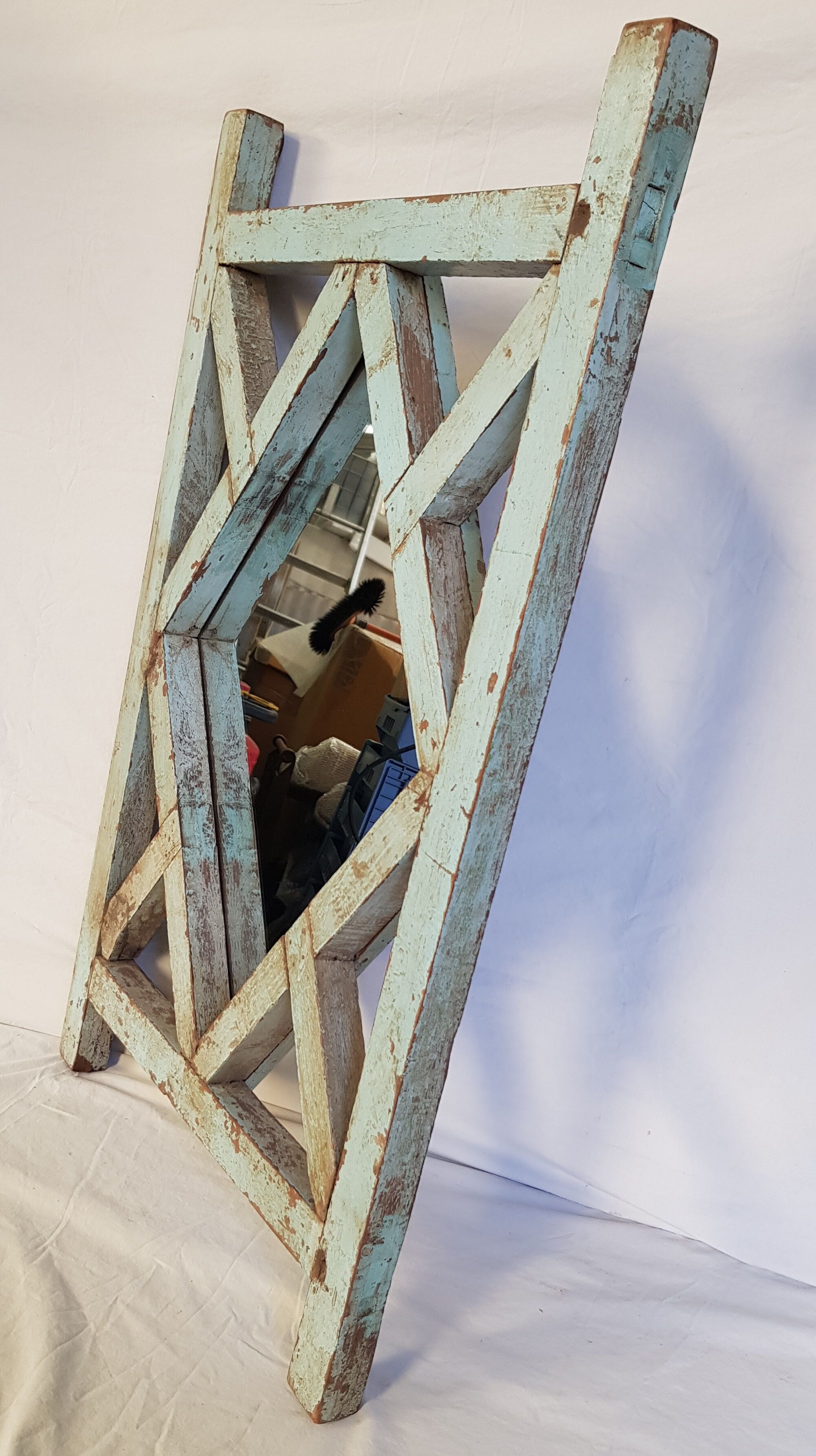 Old mirror claustras in Burmese teak