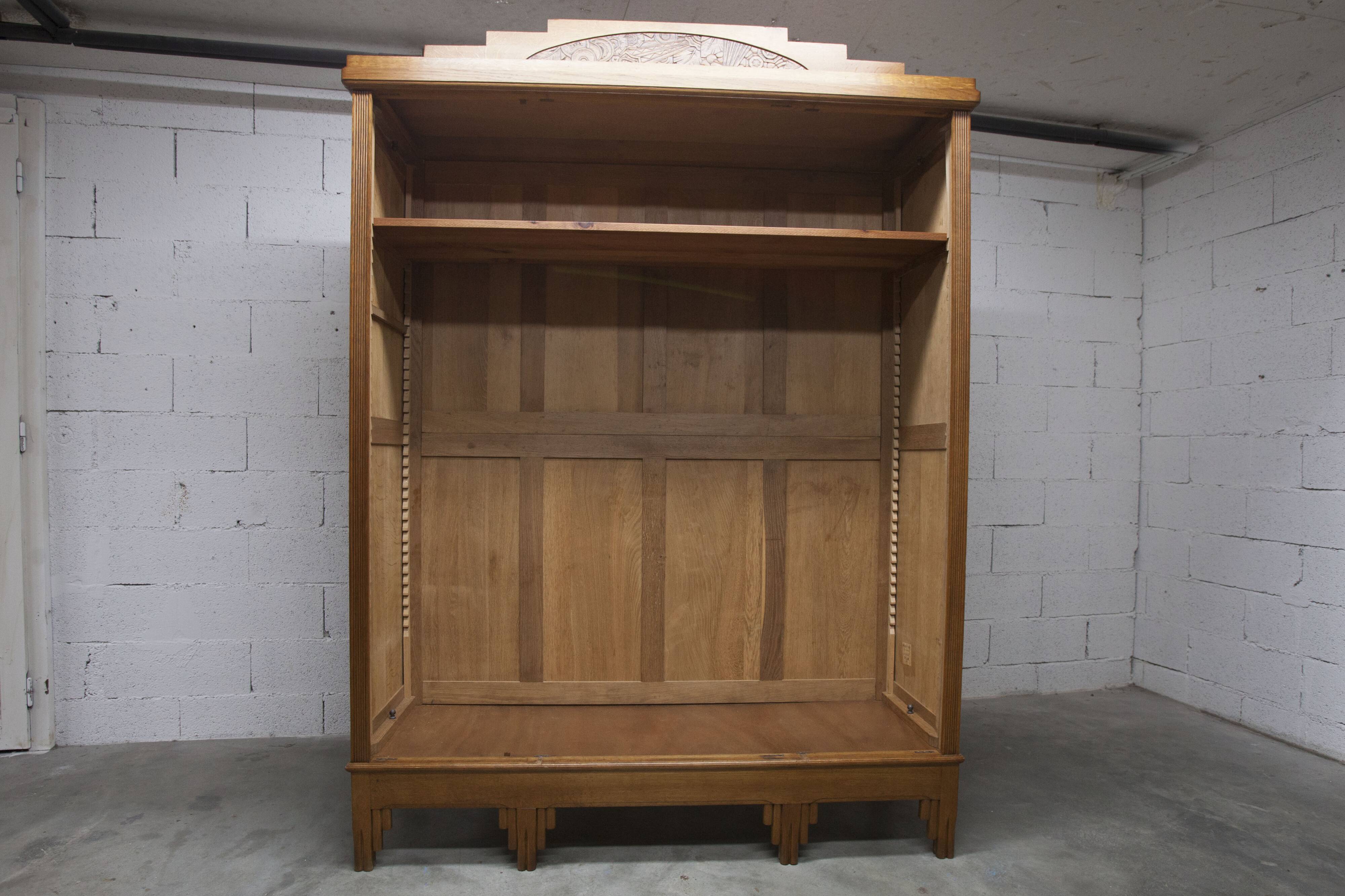 Art Deco carved oak wardrobe - Flemish workshop circa 1930