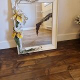 Large vintage mirror with white frame and iris and grape floral decorations