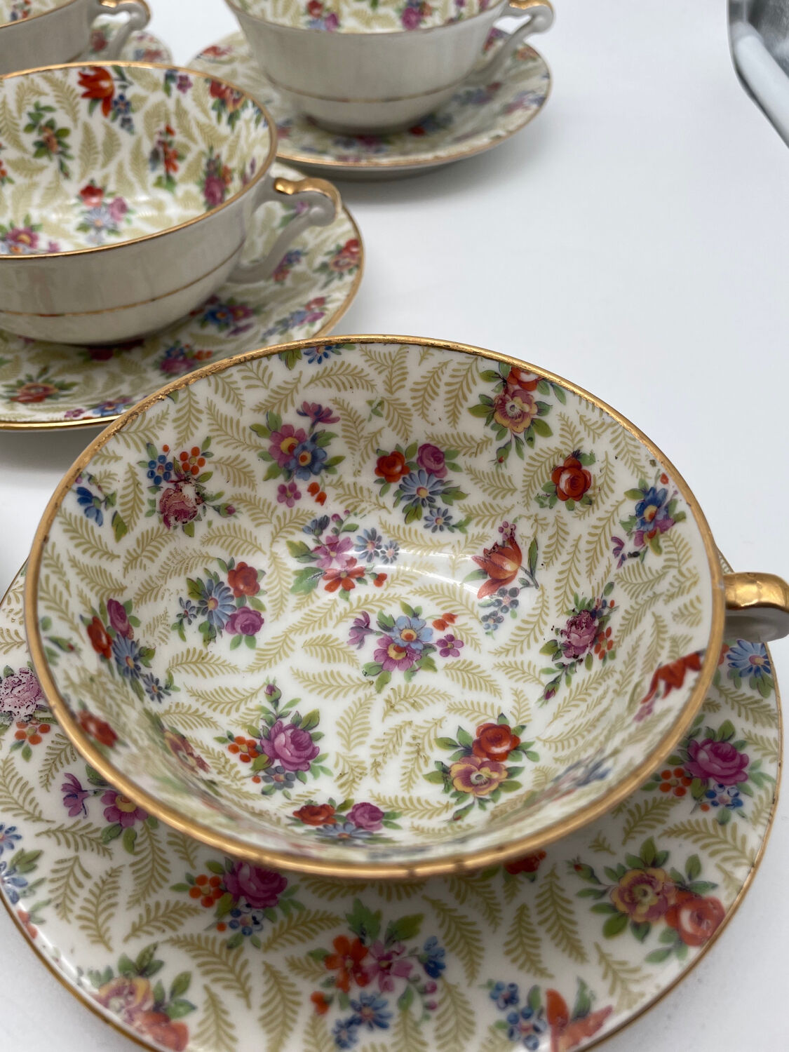 Set of 8 Limoges porcelain coffee cups from France with floral and gold pattern