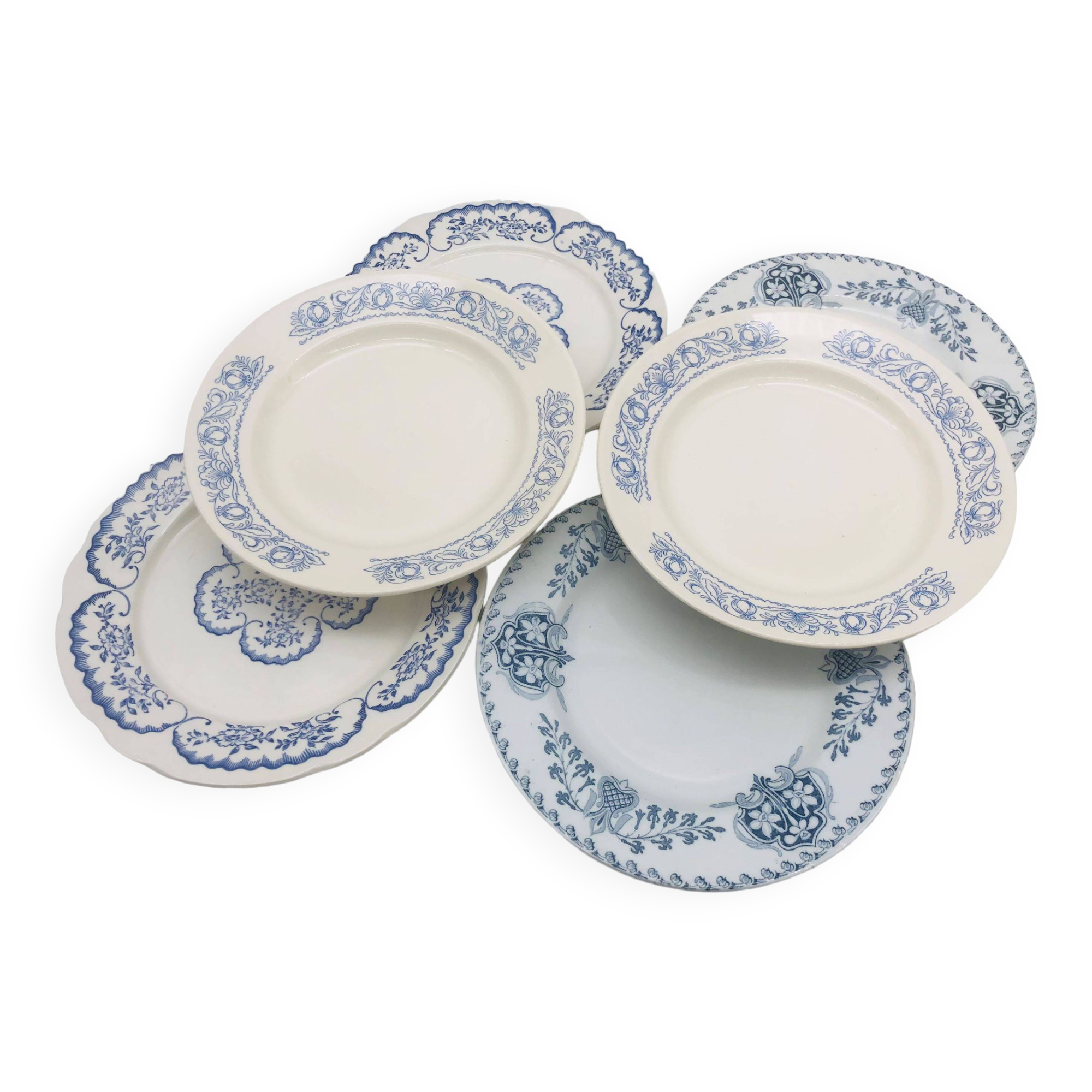 Series of 6 mismatched dinner plates.