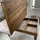 Walnut farmhouse table with swivel and extendable top