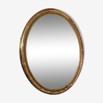 Golden oval mirror 41/35 cm