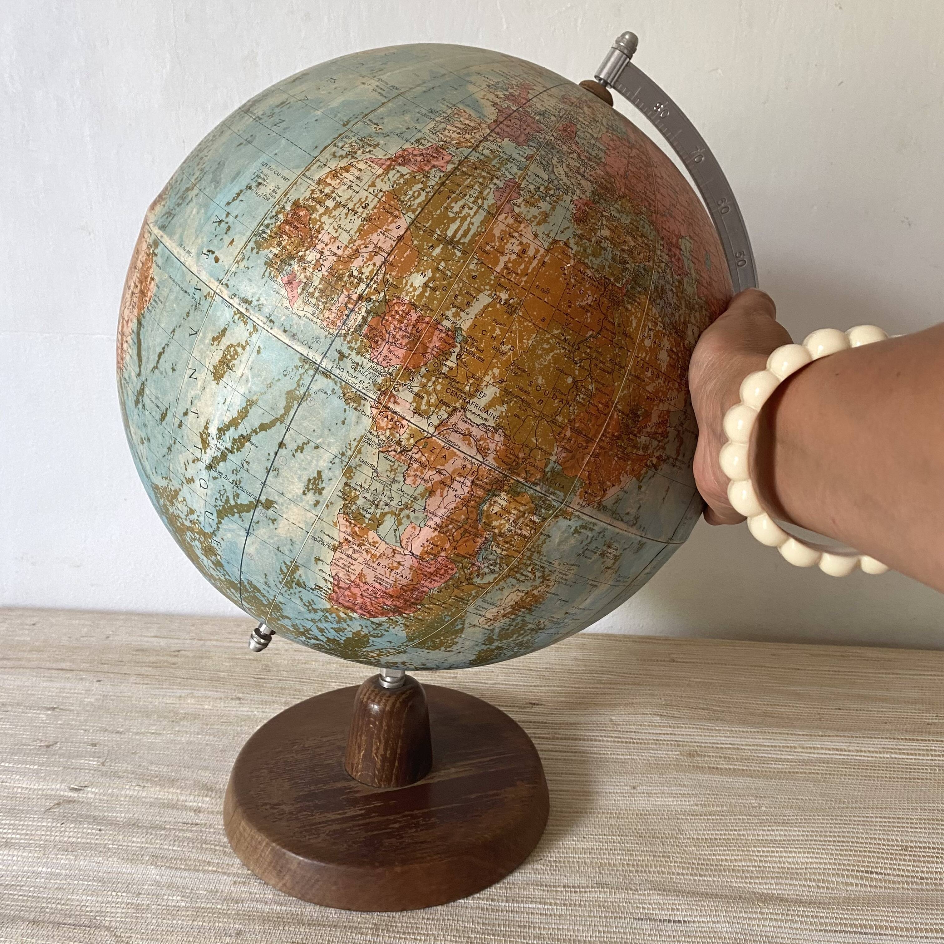 Old terrestrial globe with wooden base H46 cm