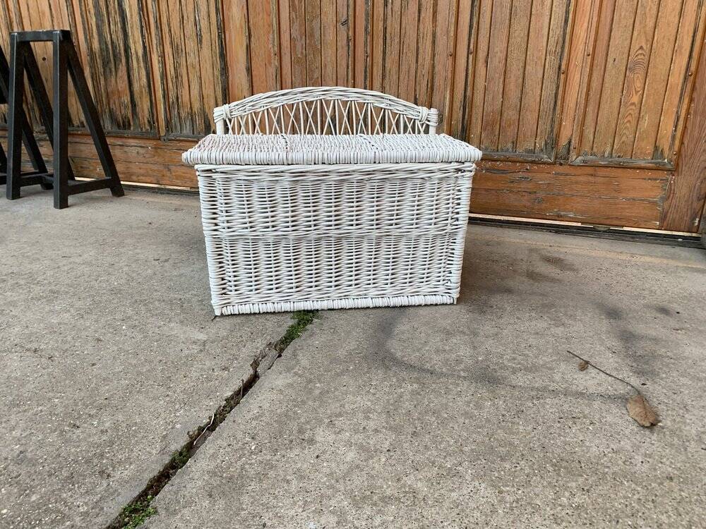 Vintage white wicker chest with double lid and decorative weaving.