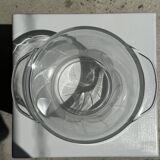 Glass ice or champagne bucket with stylized petal patterns