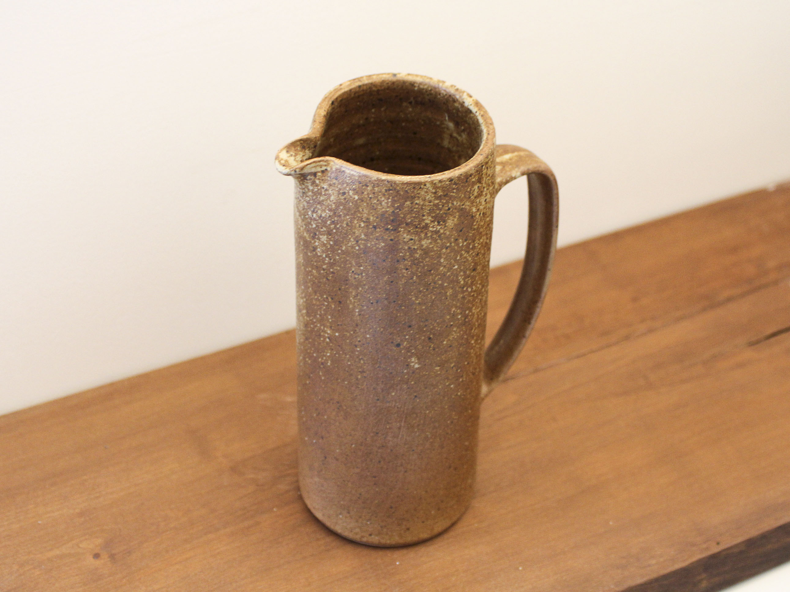 Pitcher in sandstone pyrity signed