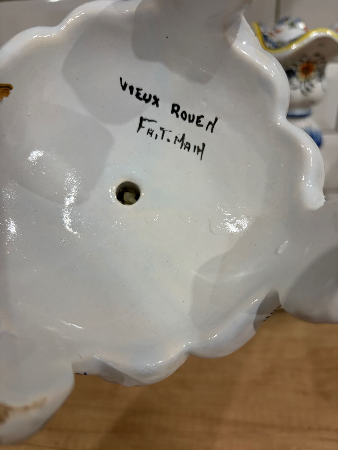 Set of two old Rouen candlesticks.