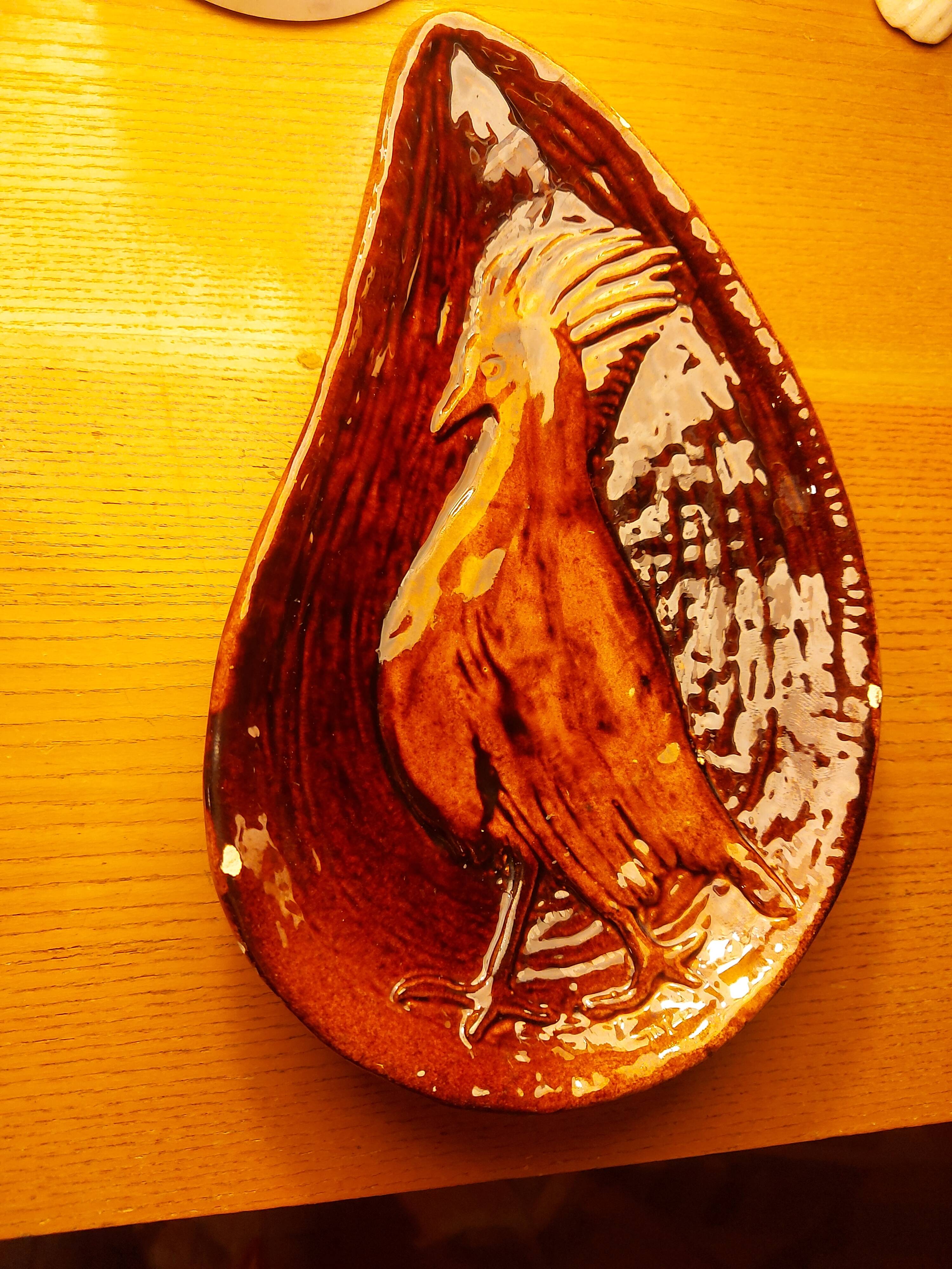 Empty pocket with vallauris bird decoration