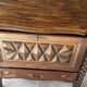 Small storage cabinet in carved oak – circa 1930