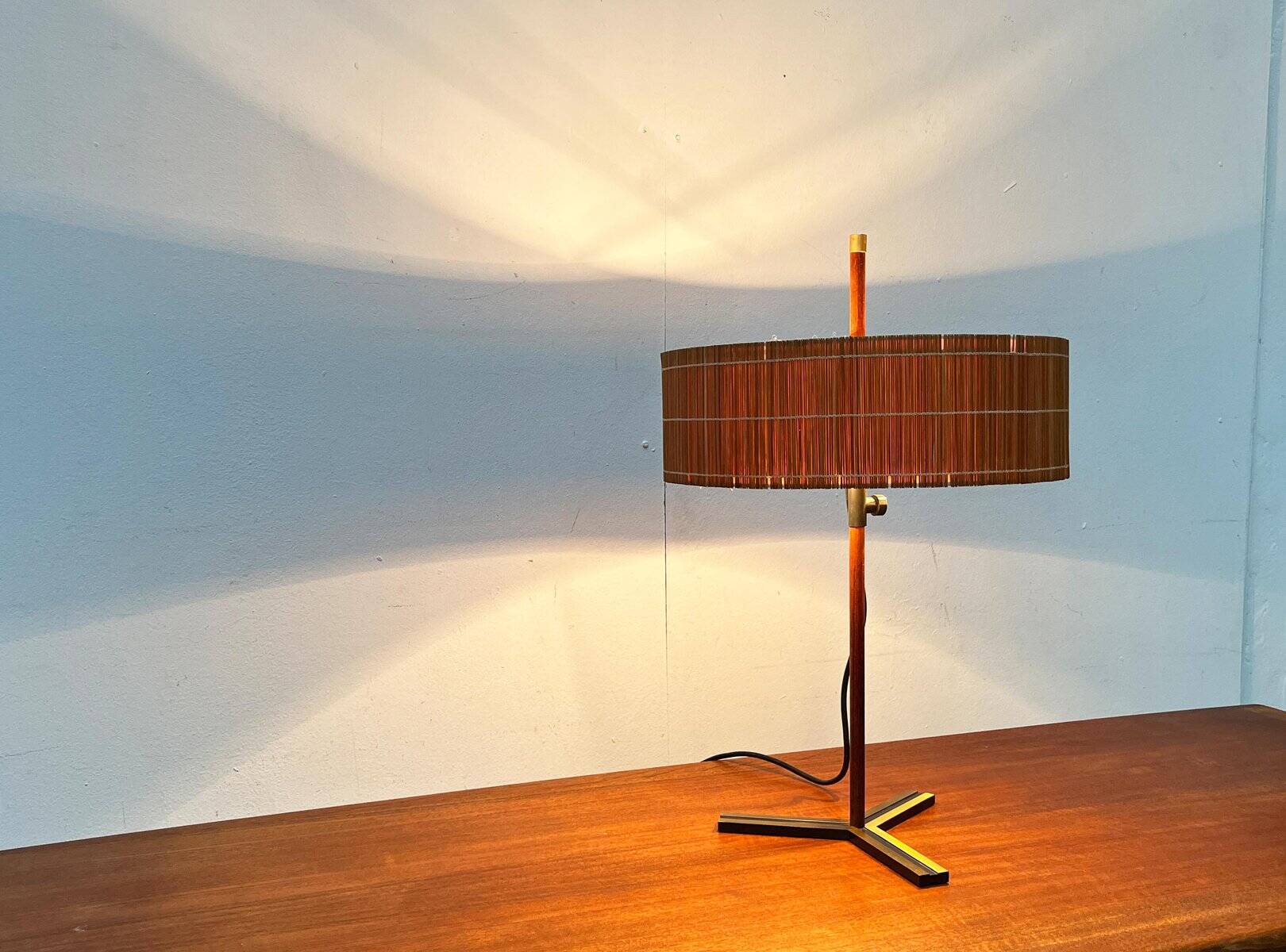 Minimalist tripod table lamp in teak, mid-century German style by Kaiser Leuchten, 1960s.
