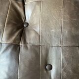 1970s Scandinavian armchair in curved laminated wood with a leather seat.