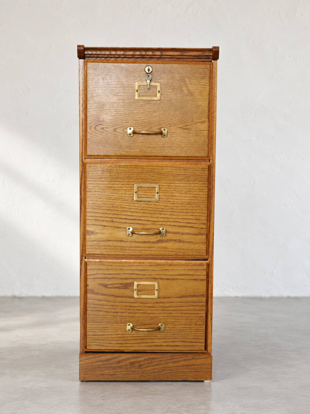 Vintage filing cabinet with three drawers