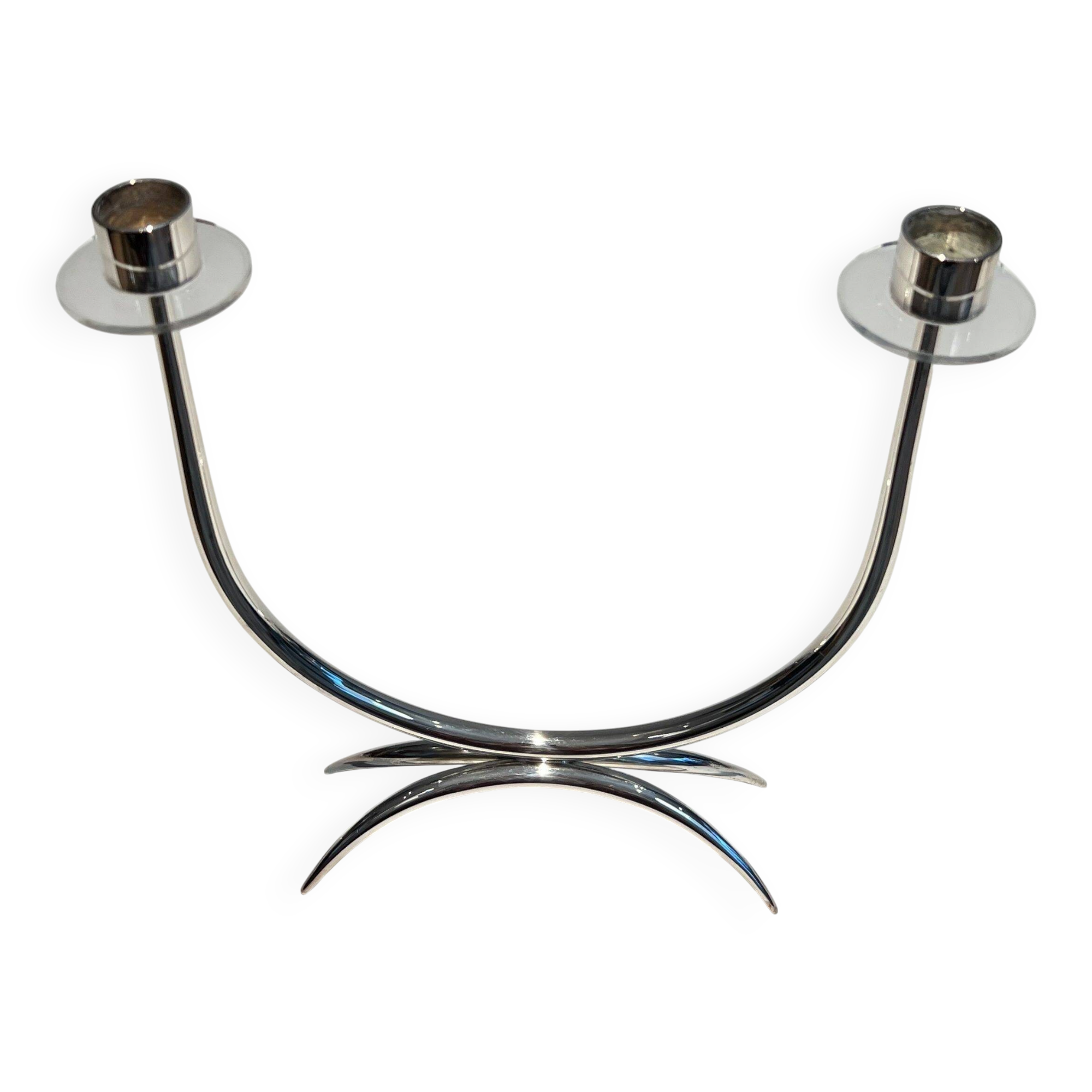 Silver-plated metal and plexiglass design candlestick.