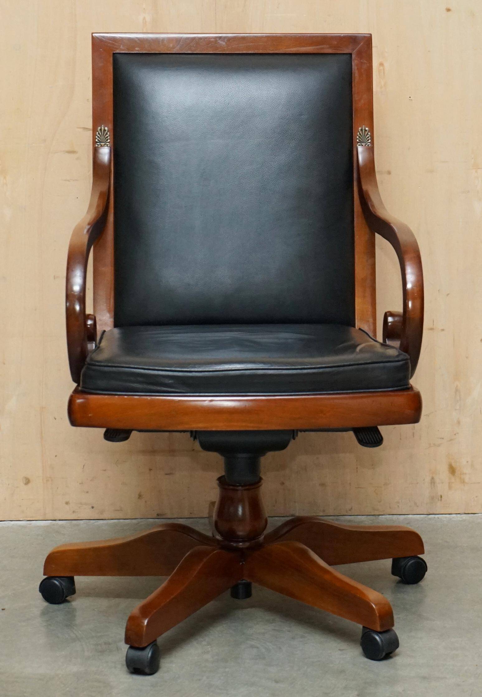 Captain's armchair in leather and cherry wood Grange Paris