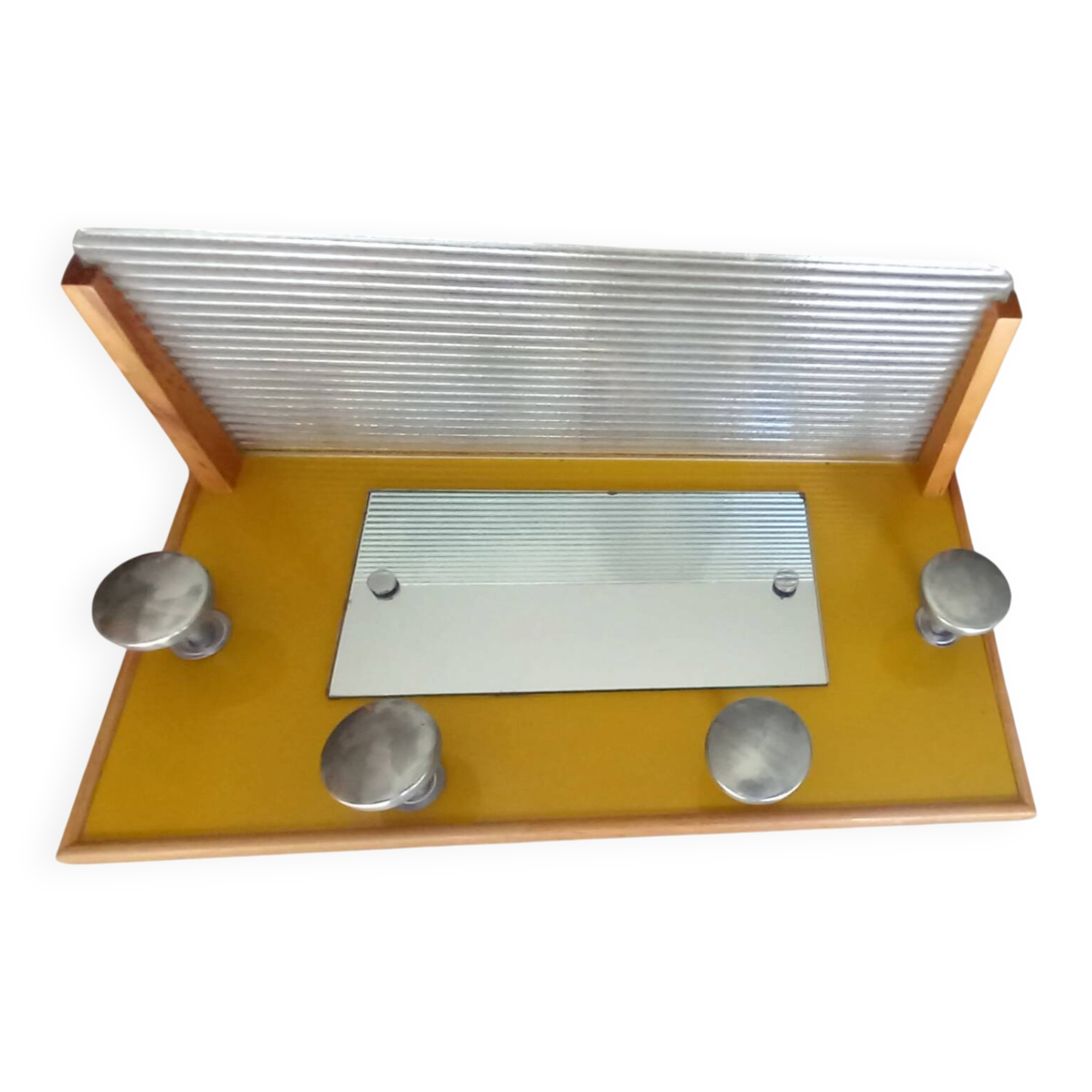 1950s coat rack with mirror, metal hooks, and glass shelf.