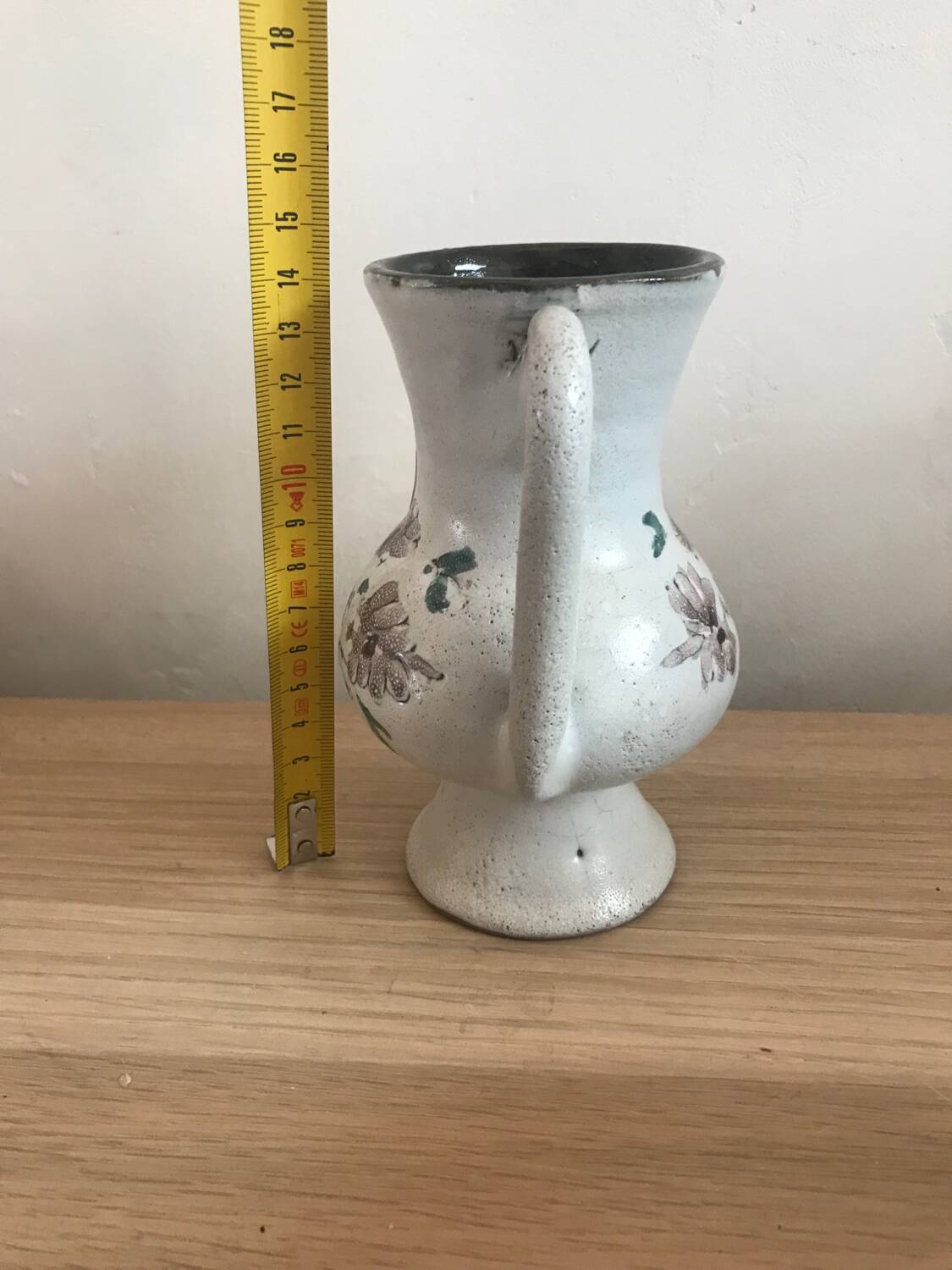 Small stoneware vase with handles and floral motifs Enameled In very good condition