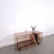 Vintage hifi, LP cabinet, TV unit made of tinted plexiglass on wheels, records.