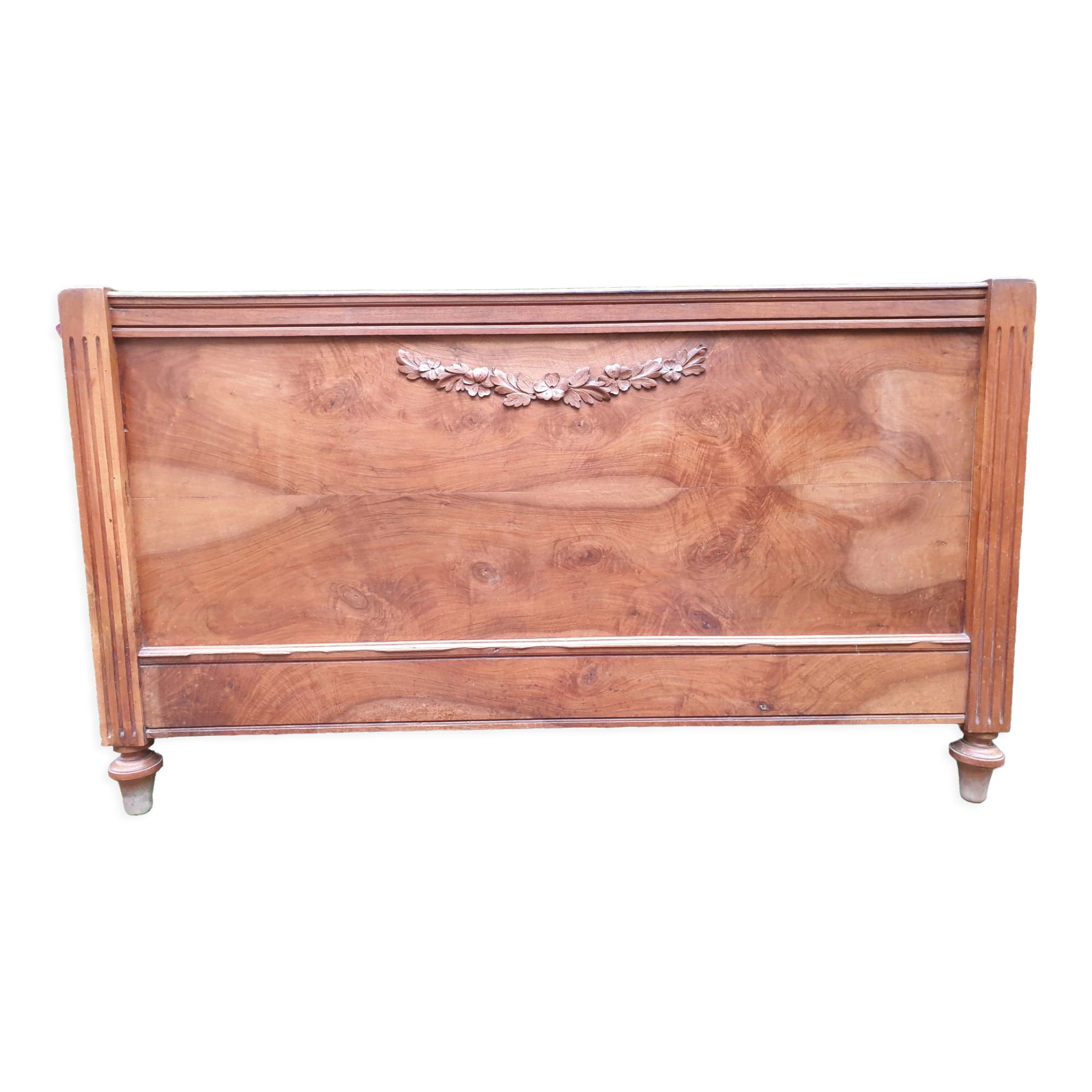 Carved walnut headboard