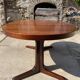 Baumann round oval extendable Scandinavian table in rosewood with 2 extensions.