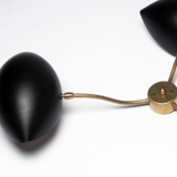 Sculptural wall lamp in brass and black metal 60 's