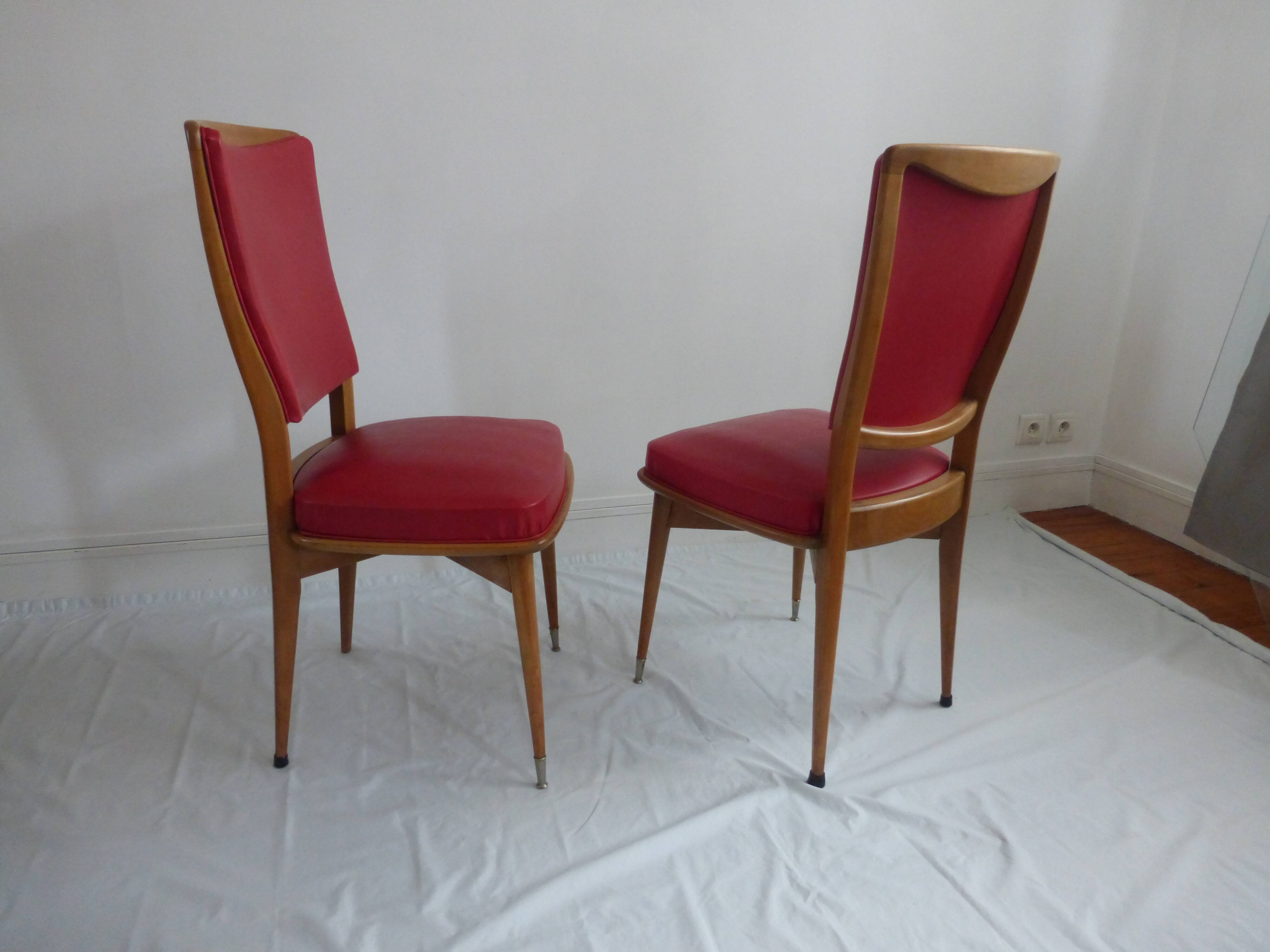 Set of five 50s wooden and red skai chairs