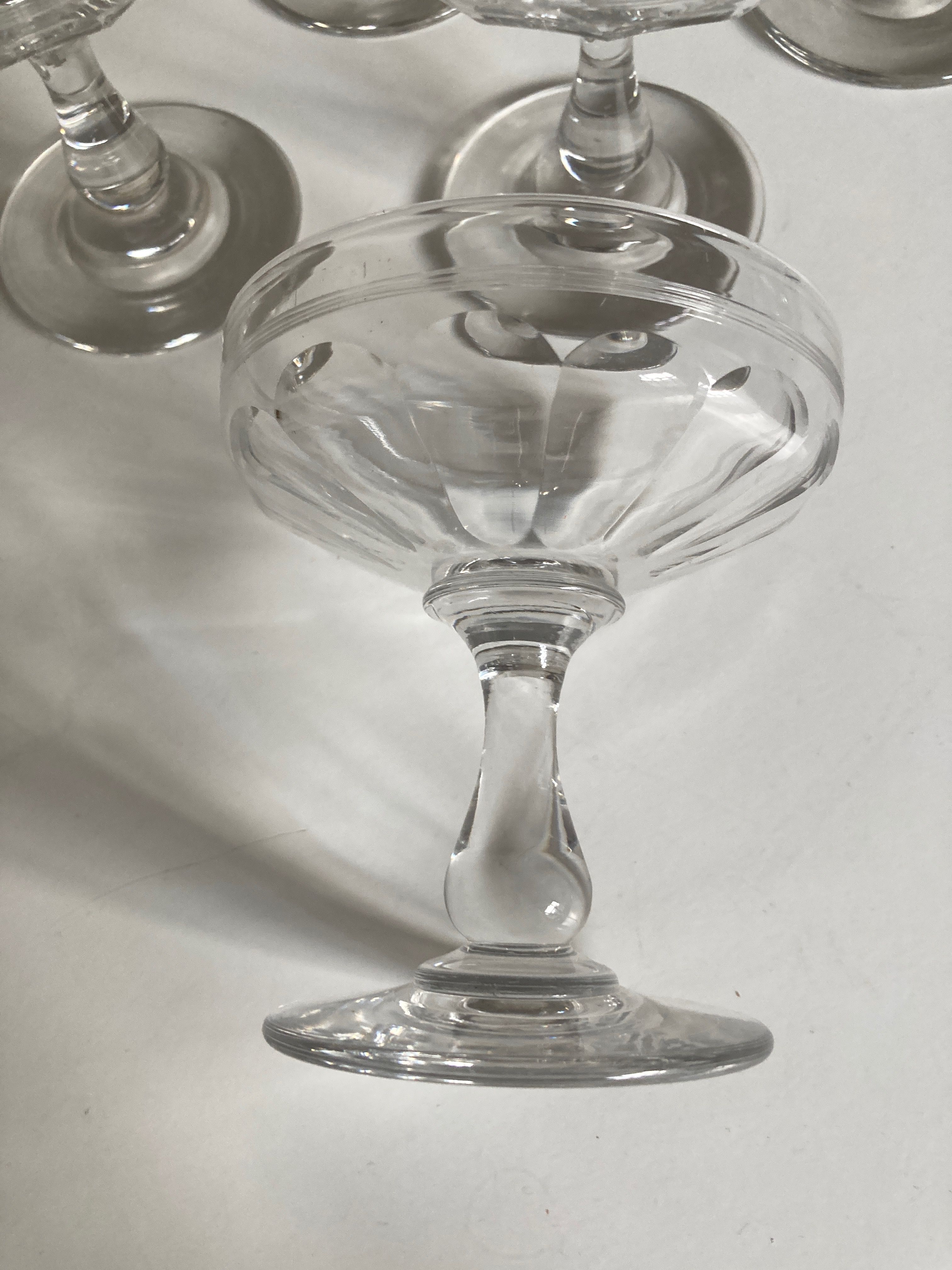 Set of 10 glasses of champagne 1870 in crystal ringing with flat ribs