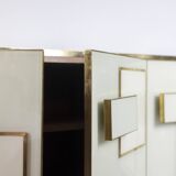 Geometric sideboard in glass and gilded brass. Contemporary Italian work.