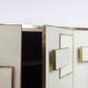 Geometric sideboard in glass and gilded brass. Contemporary Italian work.
