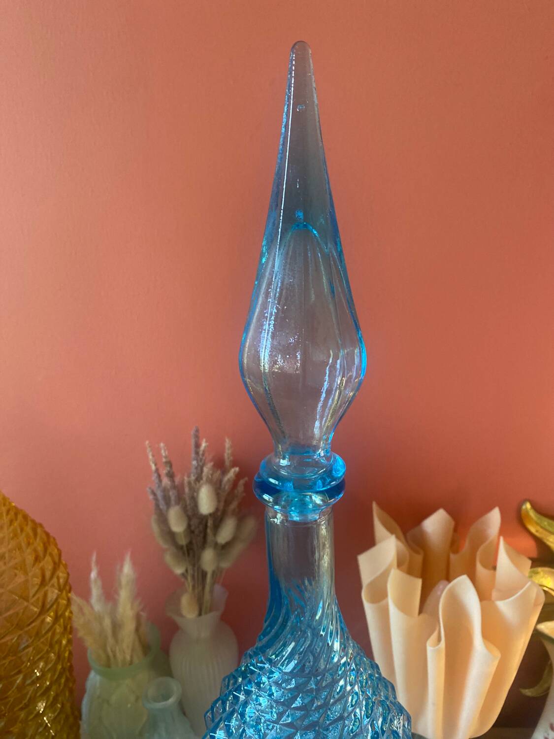 Large turquoise bottle