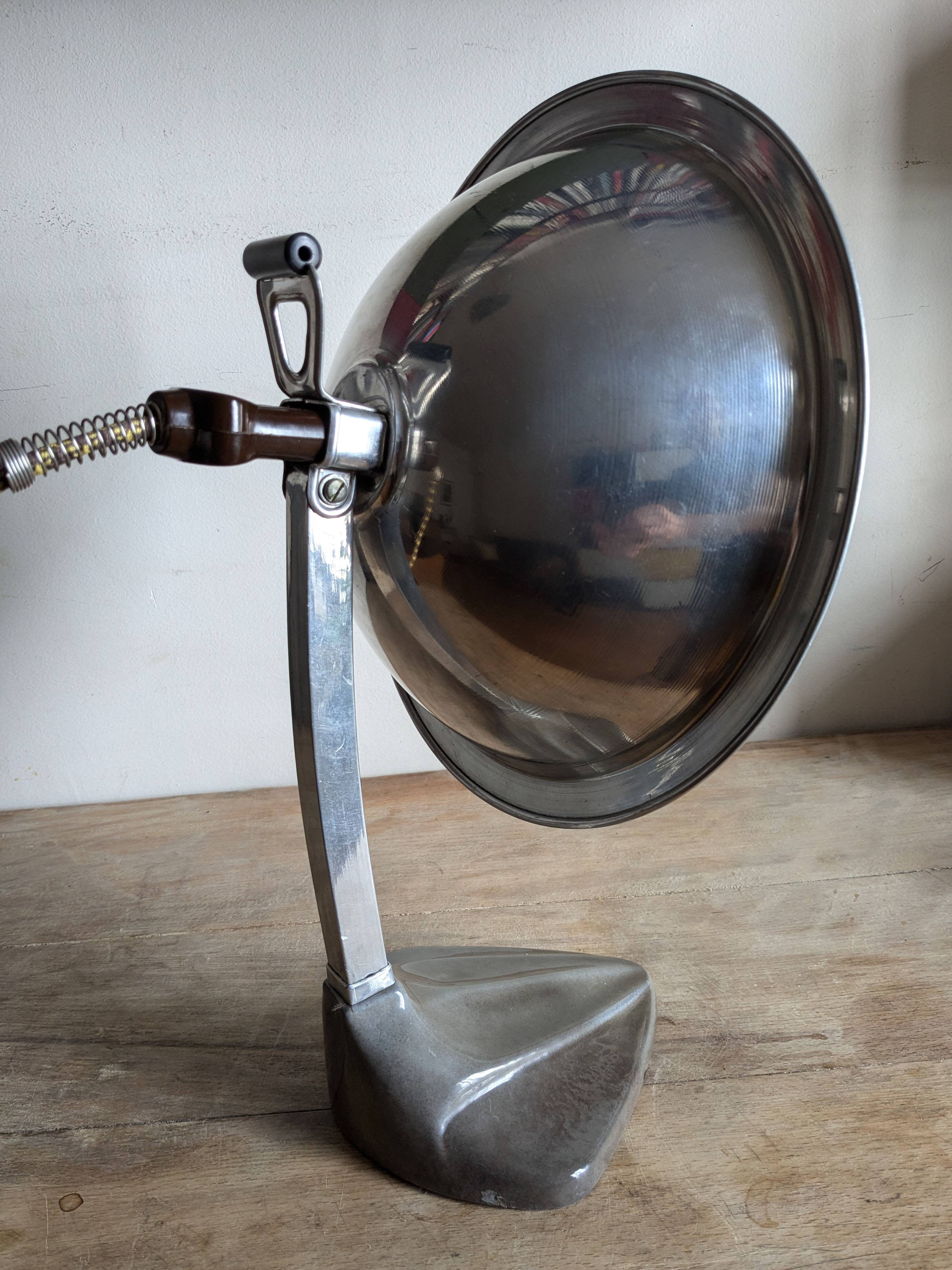 Cobra parabolic lamp with enameled cast iron base, Art Nouveau.