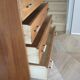 Cabinetmaker's chest of drawers - 4 drawers - golden oak - with oblique profile - compass feet - 1950