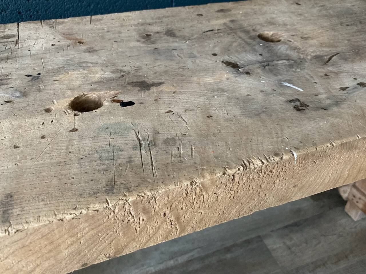 Old workbench with inclined legs