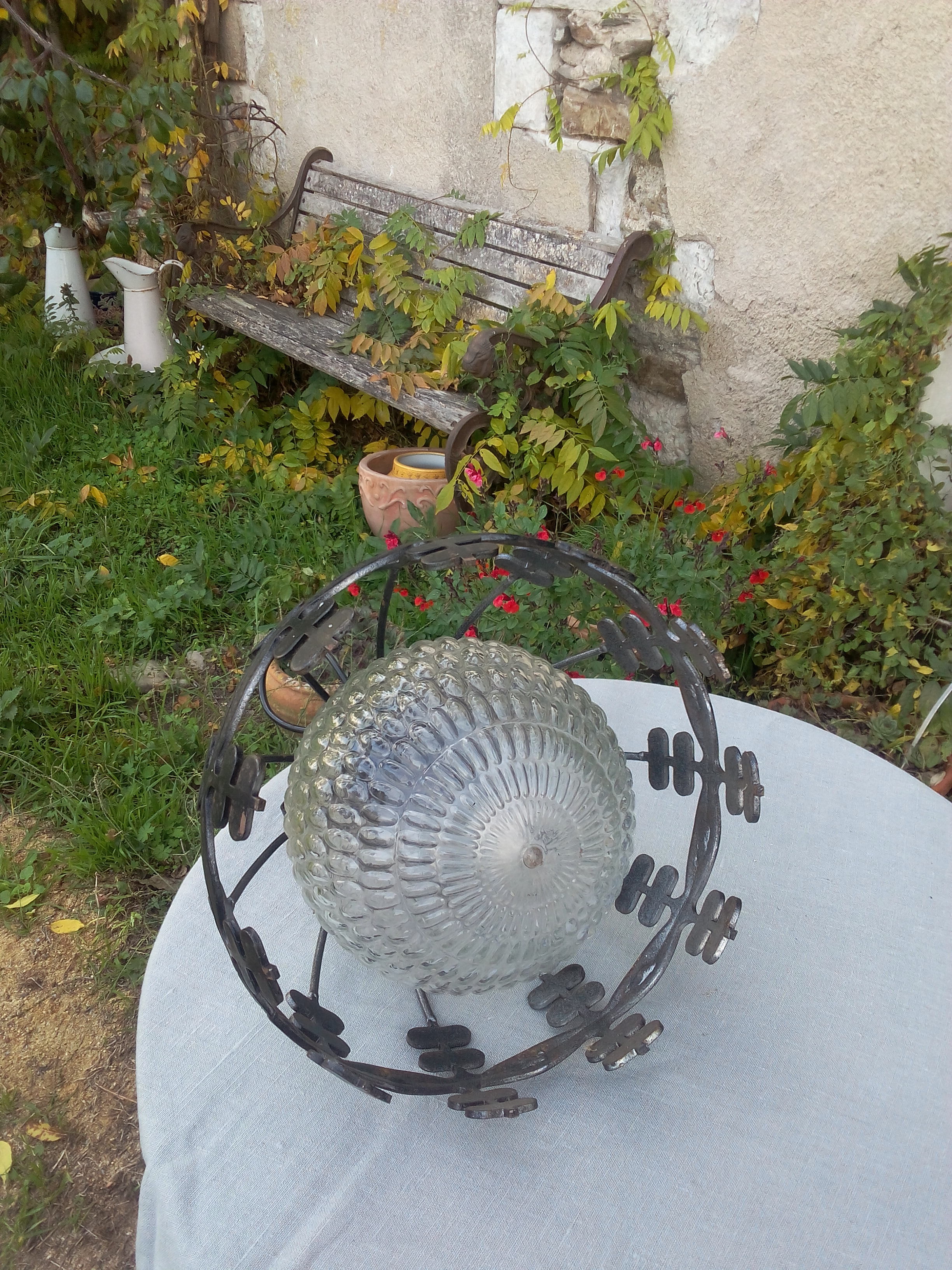 Industrial glass and wrought iron lamp