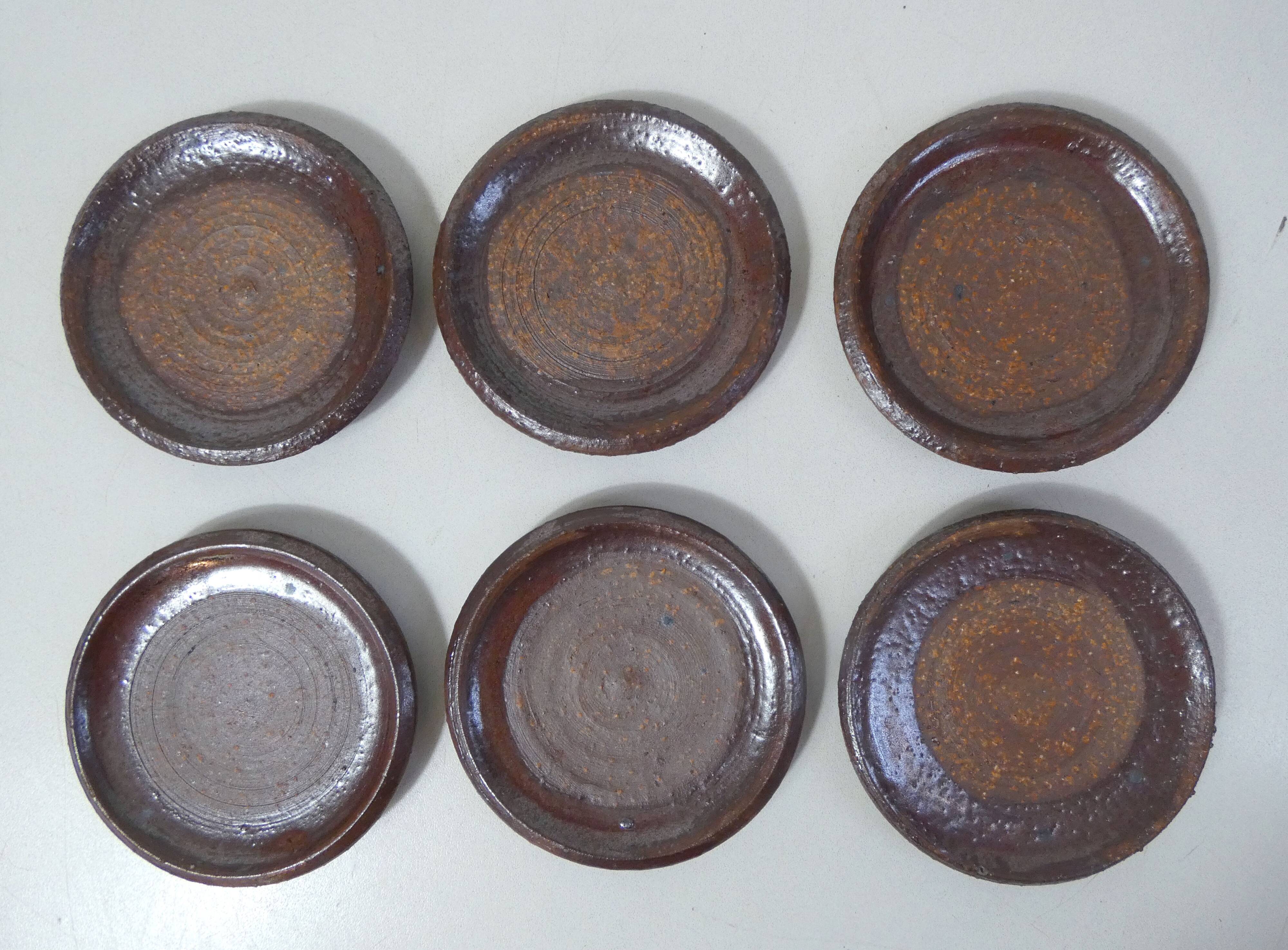 coffee service in iridescent stoneware cups and vintage sugar bowl