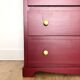 Chest of drawers with 5 drawers in black cherry.
