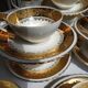 Coffee service 12 cups in white and gold porcelain
